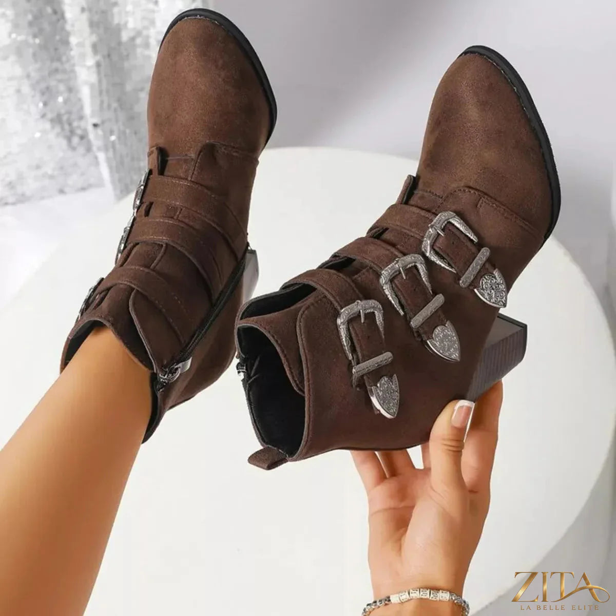 Point toe block heel boots by Trendsi, showcasing sleek black leather design with stylish ankle height and sturdy block heel.