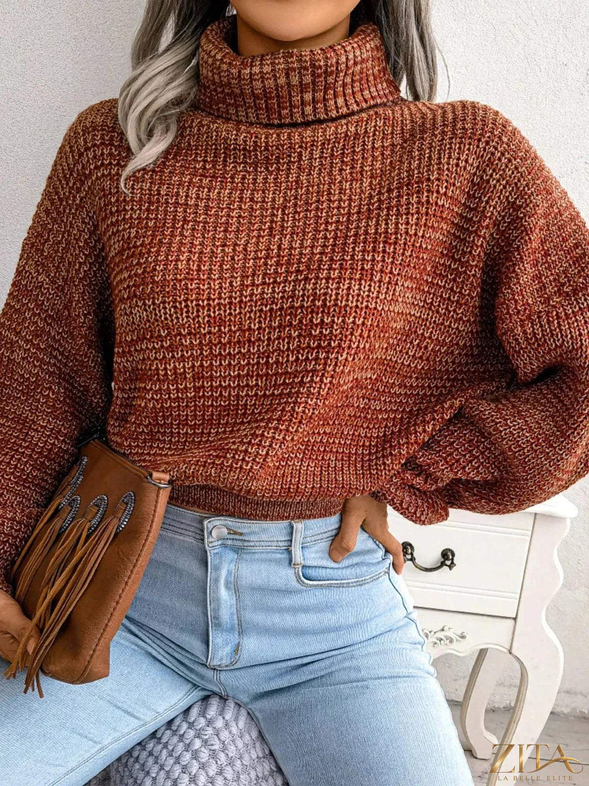 Light beige turtleneck dropped shoulder sweater by Trendsi, featuring a cozy knit texture and relaxed fit.