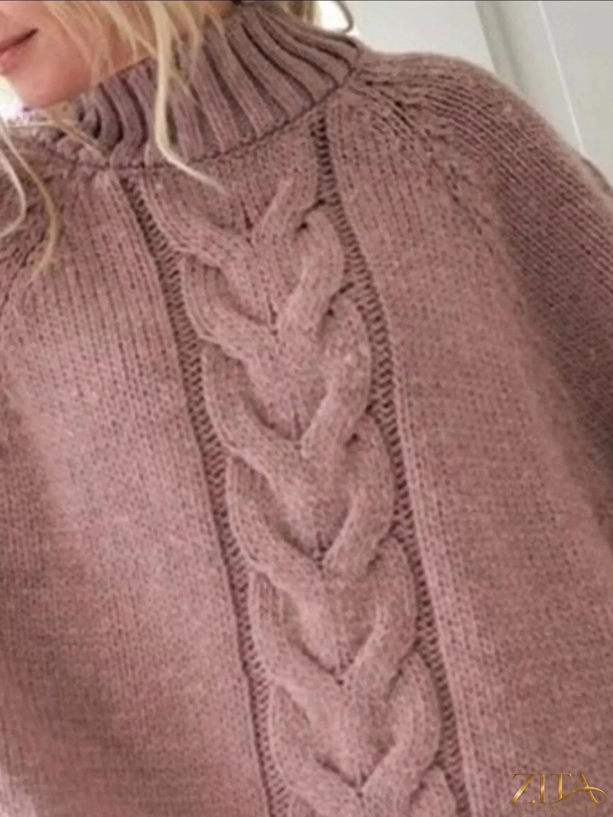 Zita La Belle Elite cable-knit long sleeve sweater in soft, cozy fabric with a classic knit pattern and ribbed cuffs.