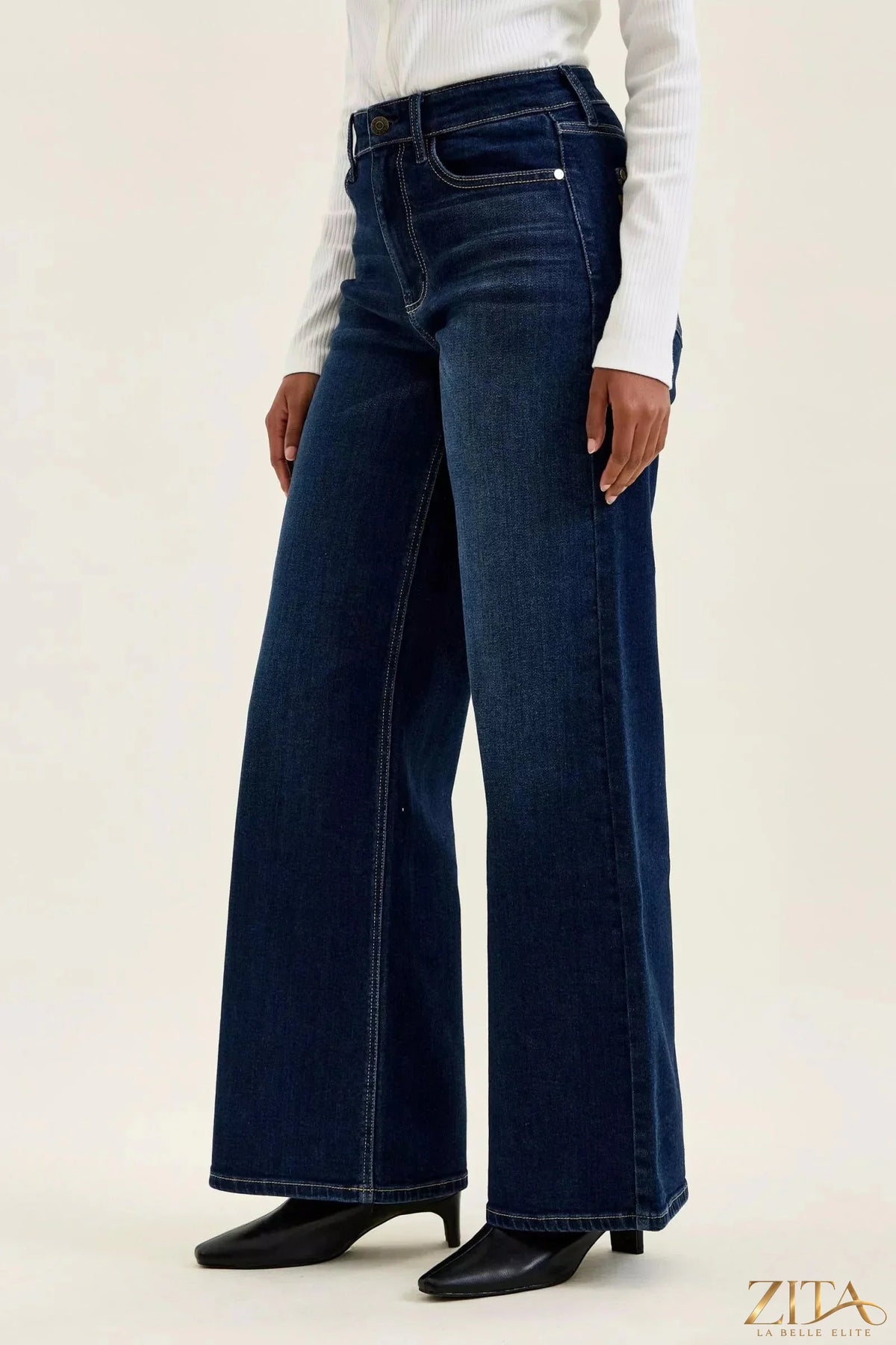 Zita La Belle Elite Judy Blue high-waisted wide-leg dark wash jeans displayed on a model with front pockets and relaxed fit.