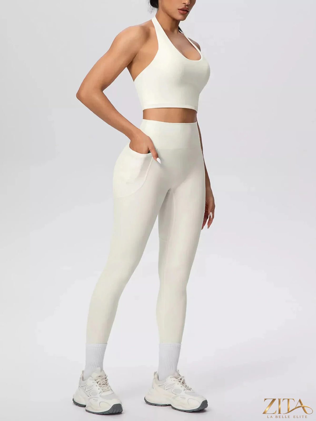 Zita La Belle Elite halter neck crop top and high-waisted leggings active set, black, form-fitting athletic wear for women.