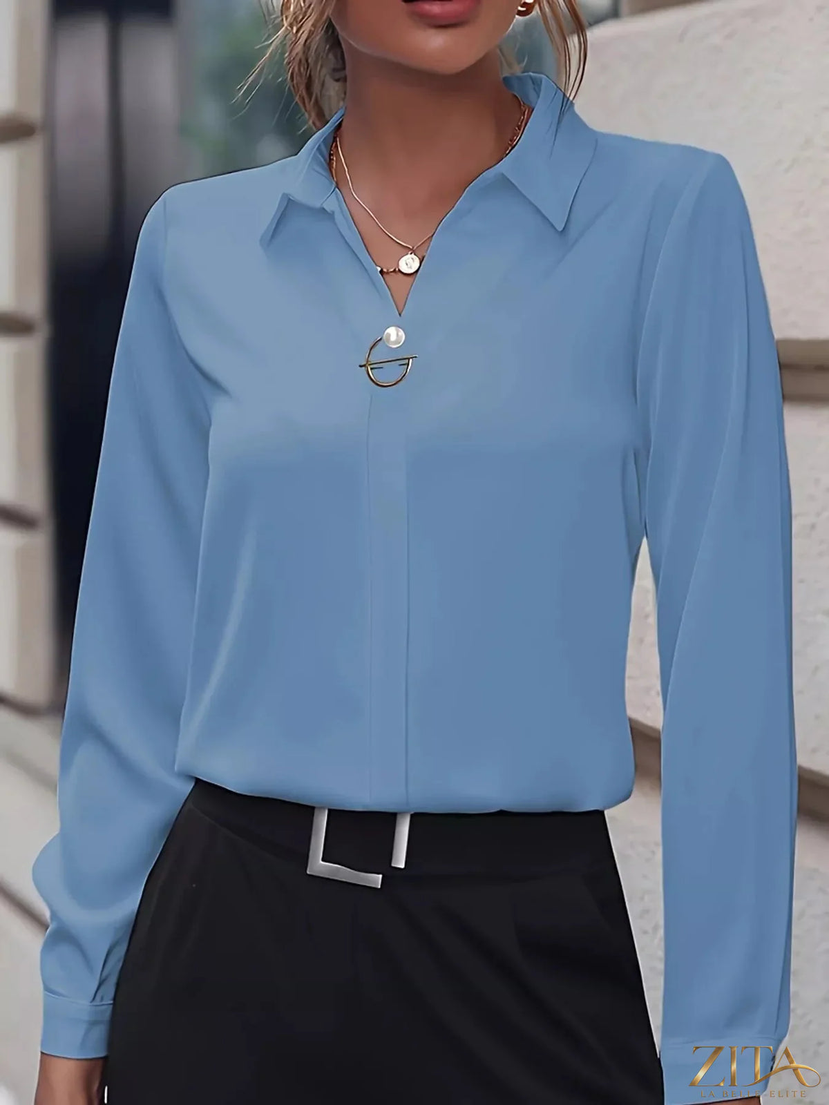 Zita La Belle Elite long sleeve satin blouse in elegant fabric, shown in a stylish close-up image.