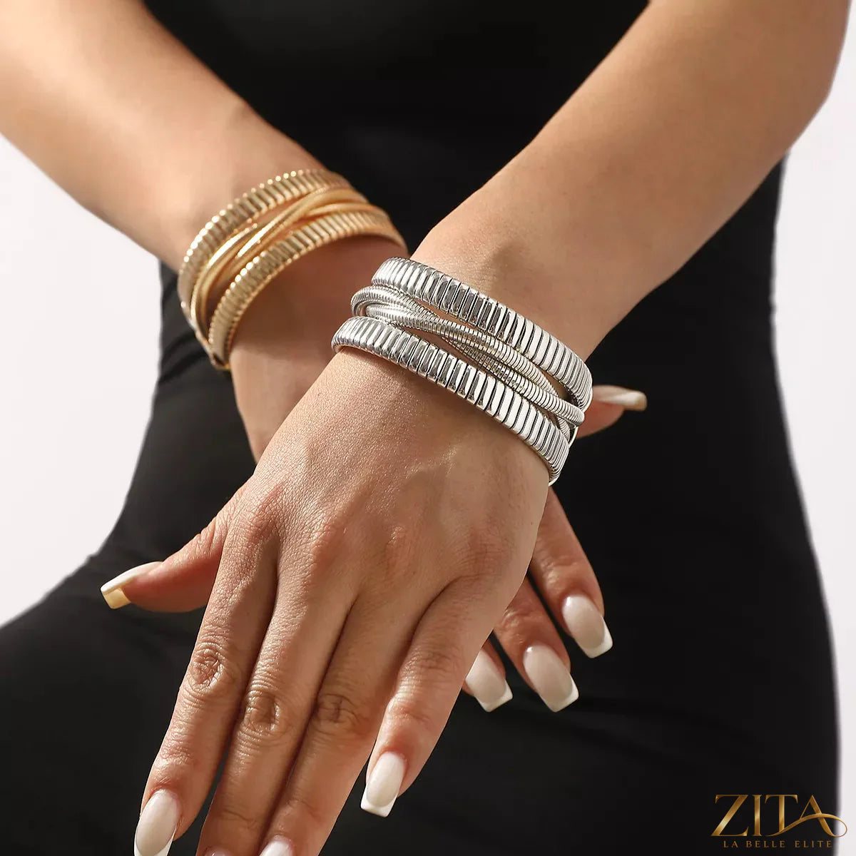 Multi-layered open bracelet by Zita La Belle Elite featuring delicate gold and silver chains and minimalist design.