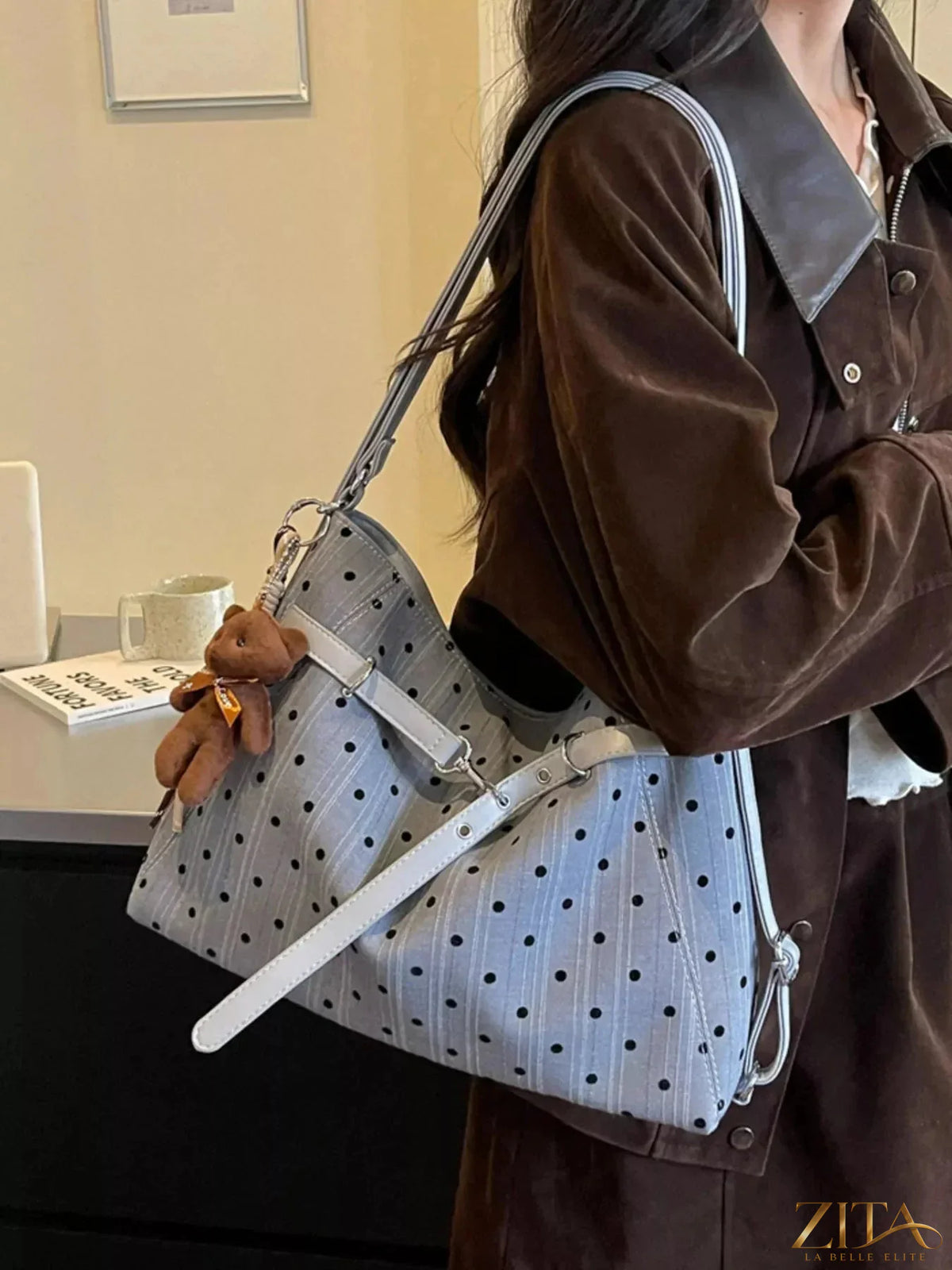 Zita La Belle Elite polka dot shoulder bag with adjustable strap and top zipper closure, stylish accessory for everyday use.