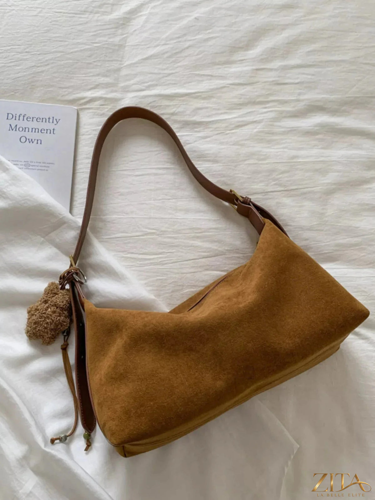 Zita La Belle Elite solid color suede hobo crossbody bag with a relaxed, slouchy design and adjustable strap.