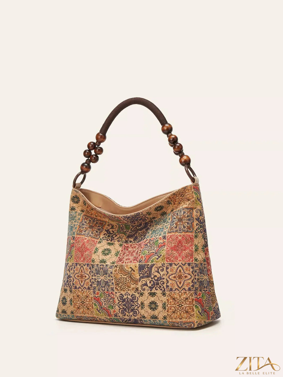 Zita La Belle Elite bohemian hobo handbag with geometric pattern and woven design, featuring a curved shape and shoulder strap.