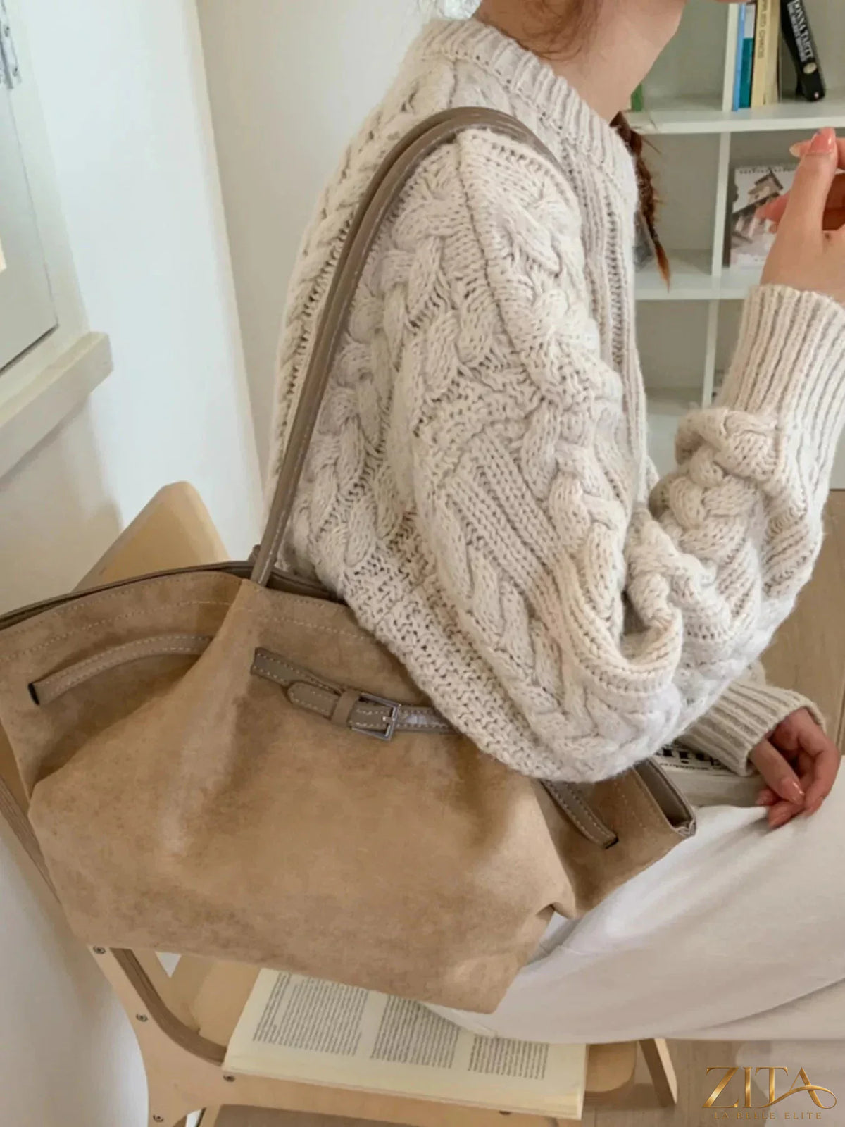 Zita La Belle Elite solid color buckle tote bag with top handles and adjustable strap, made of durable material.