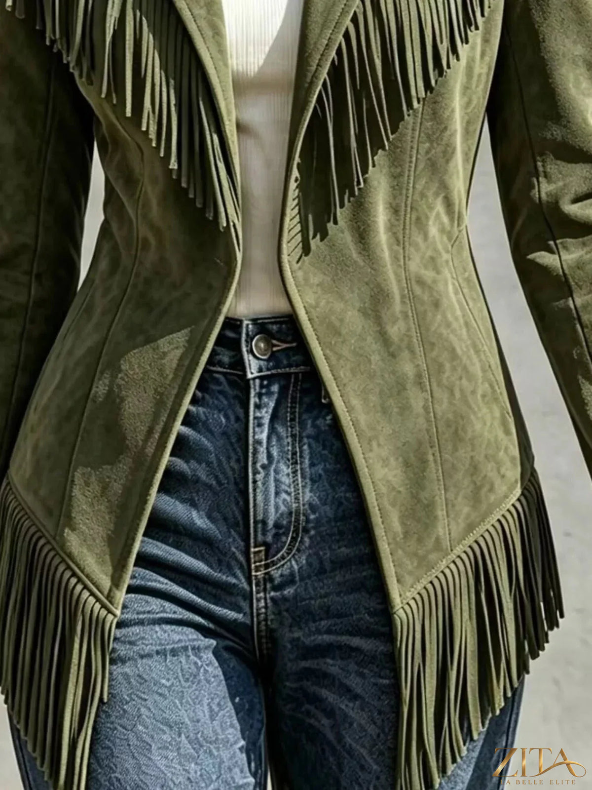 Western-inspired fringed open front jacket from Trendsi, featuring suede-like material and fringe details, casual western style.