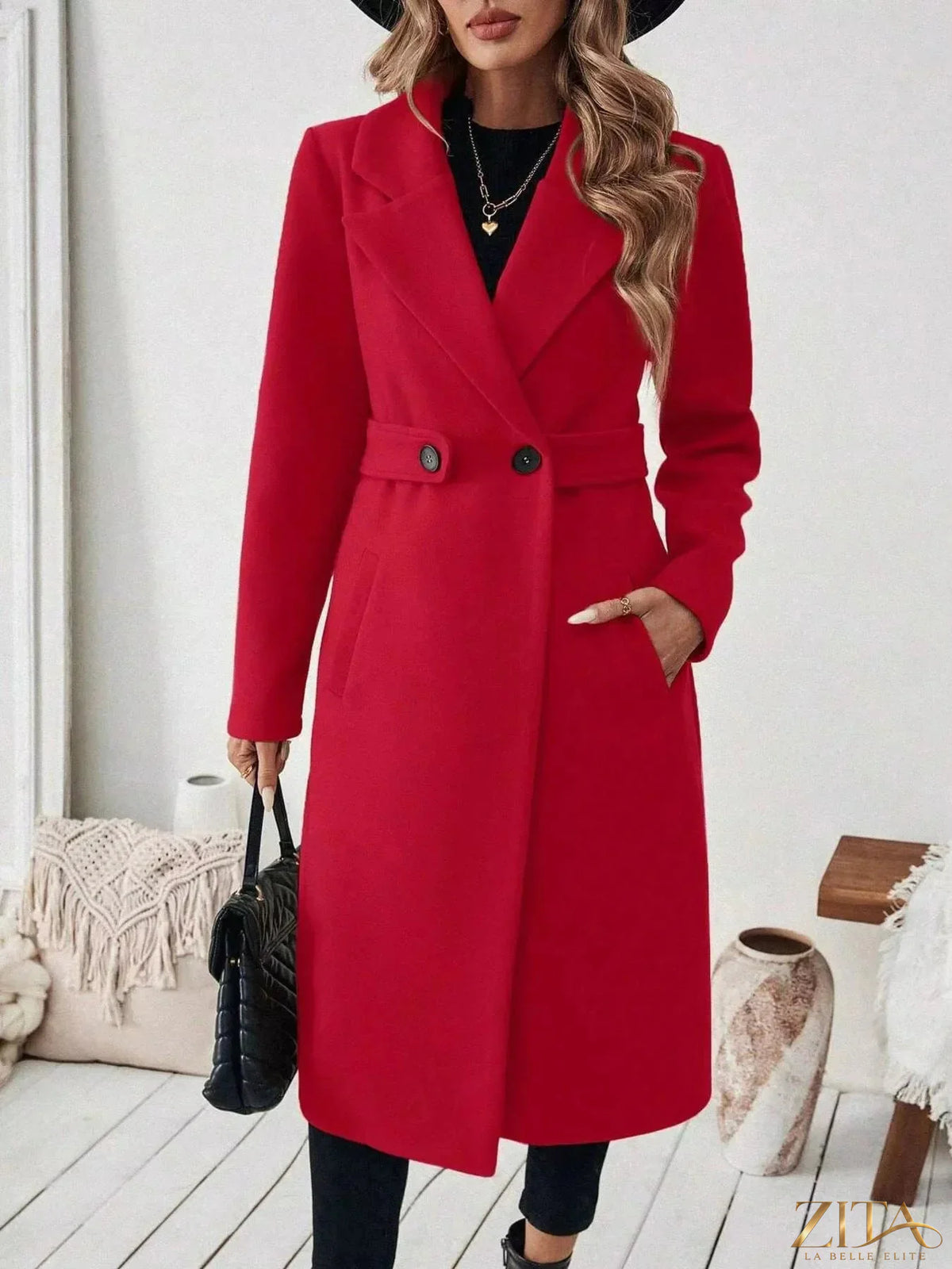 Zita La Belle Elite single-button longline coat in neutral fabric, displayed on a hanger with a tailored silhouette and sleek design.