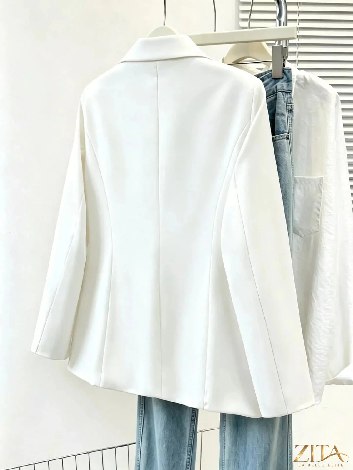 Plus size Zita La Belle Elite blazer with a single-breasted design, lapel collar, and tailored fit in a full-size style.