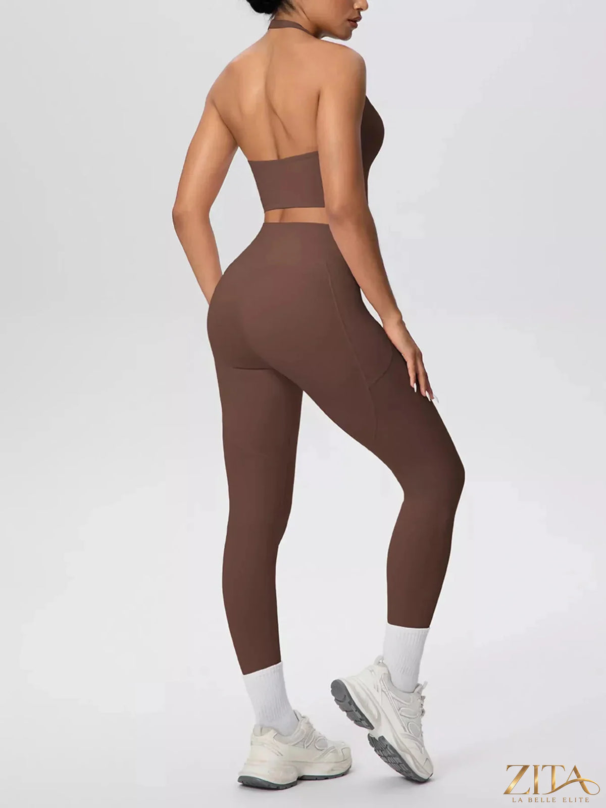 Zita La Belle Elite halter neck crop top with high-waisted leggings active set, shown in a stylish workout outfit on a model.