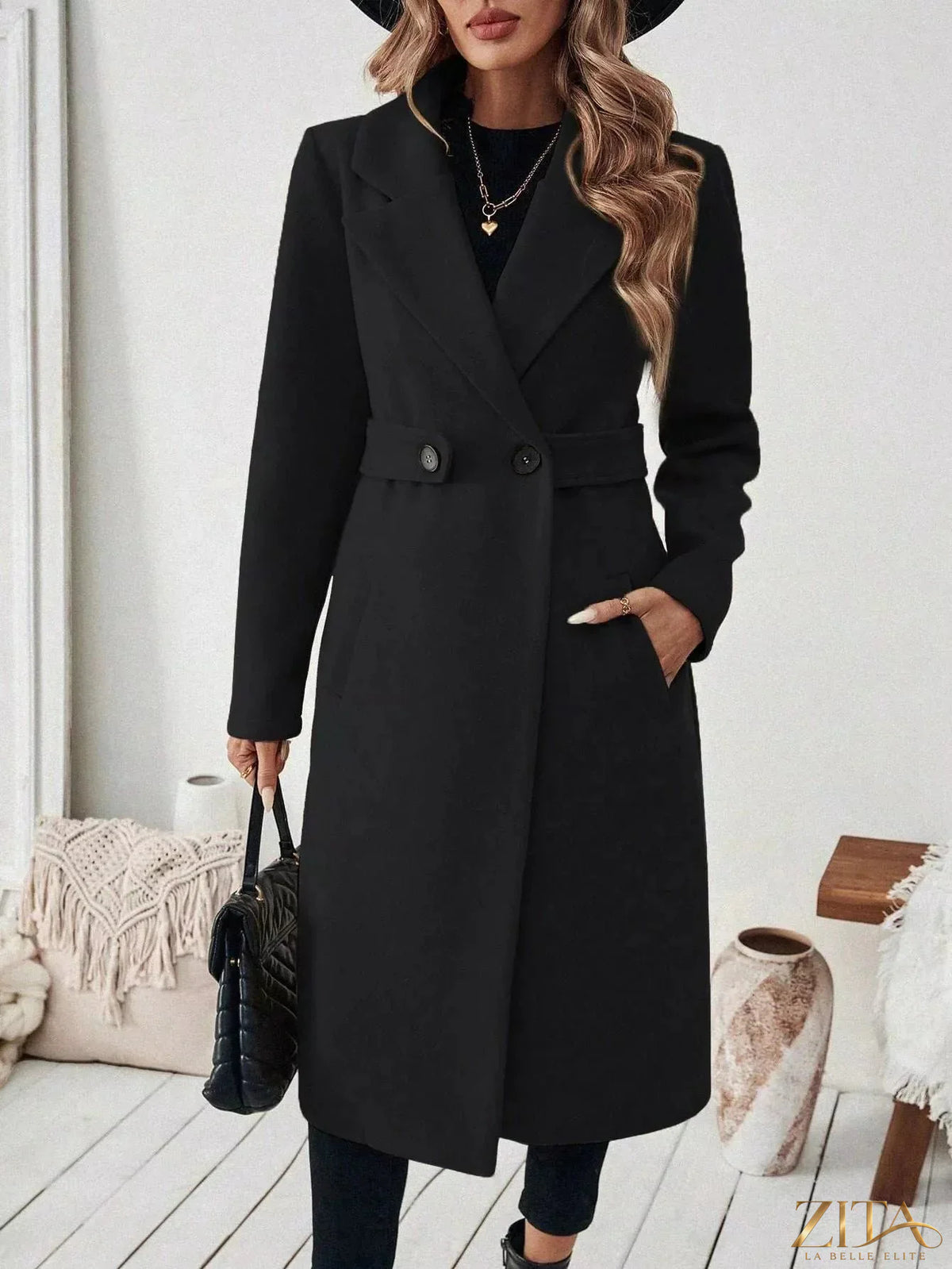Longline single-button coat by Zita La Belle Elite, shown in black with a sleek collar and tailored fit.