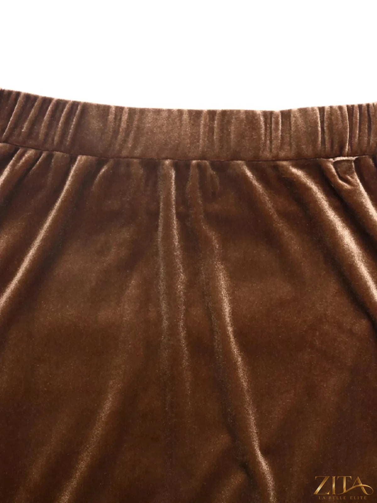 Velvet tiered midi skirt in rich color, featuring a flowing, layered design perfect for stylish, elegant looks.
