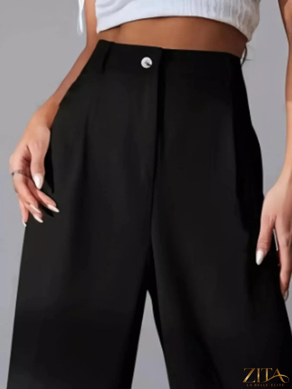 Zita La Belle Elite wide leg pleated pants in a flowing fabric, showcasing a stylish, relaxed fit with pleats and a high waist design.
