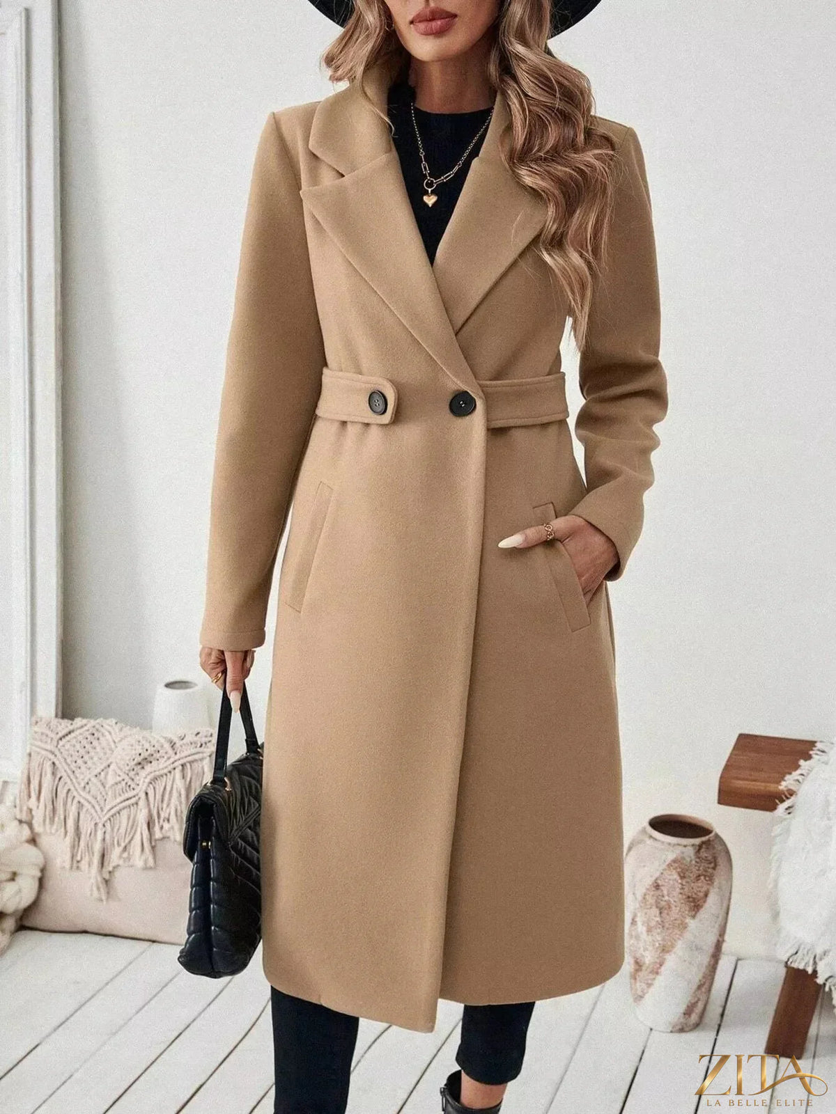 Zita La Belle Elite longline coat with lapel collar, featuring a sleek design and tailored fit, displayed on a neutral background.