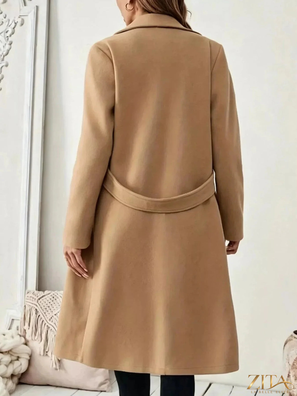 Zita La Belle Elite single-button longline coat in neutral fabric, displayed on a hanger with a tailored fit and classic collar.
