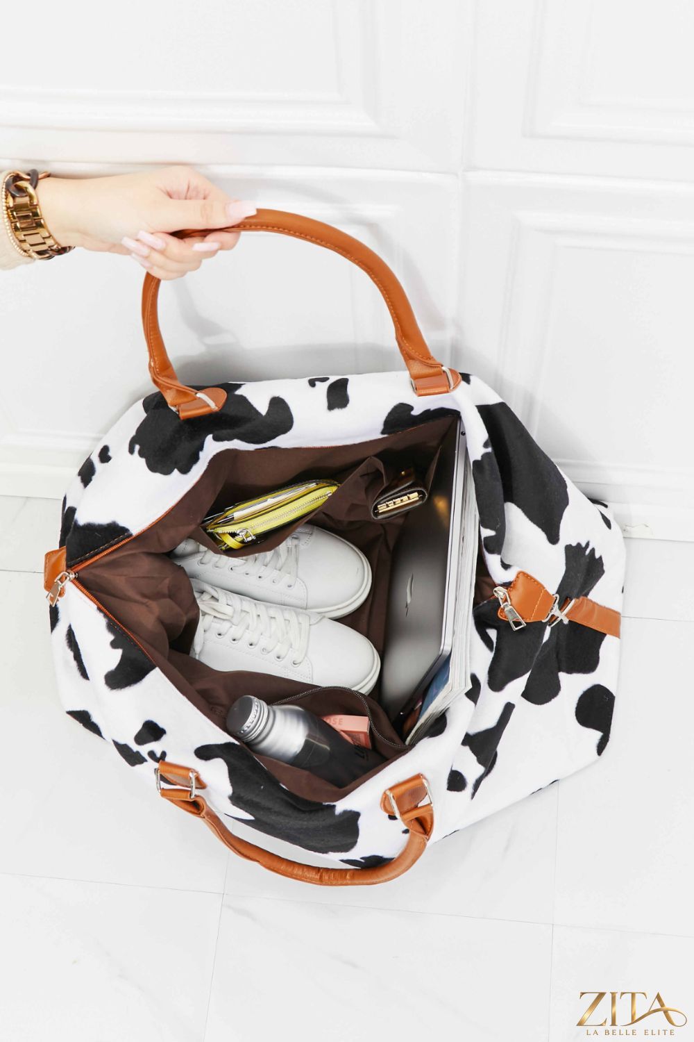 Zita La Belle Elite animal print plush weekender bag with handles and zipper closure for travel and weekend trips.