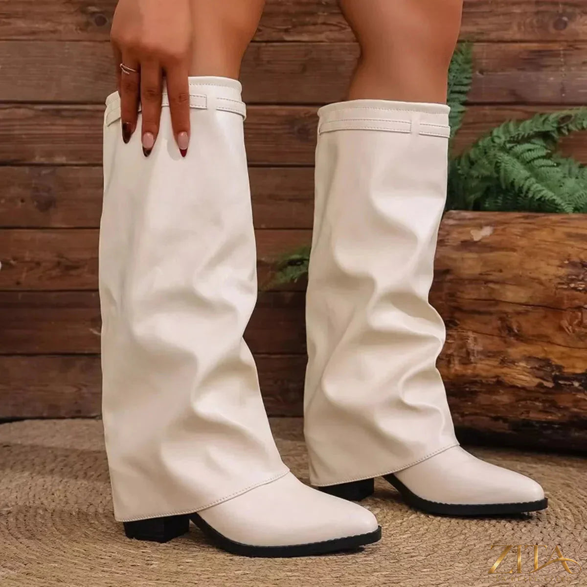 Zita La Belle Elite point toe block heel boots featuring sleek design and stylish black leather finish.