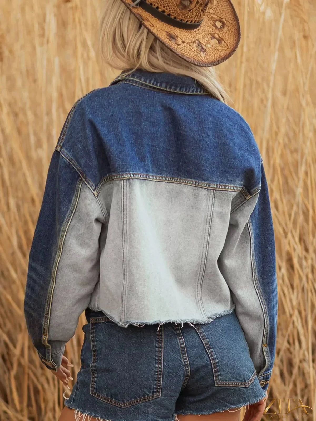 Color block patchwork raw hem denim jacket by Zita La Belle Elite featuring multicolor panels and distressed raw hem detail.