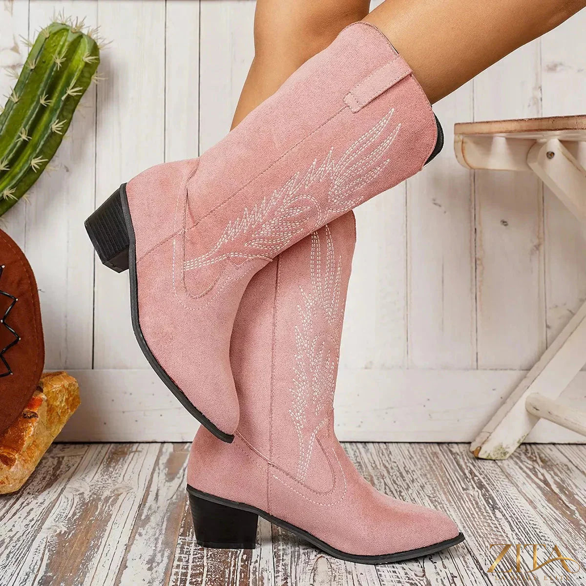 Zita La Belle Elite point toe block heel boots showing a sleek black leather design with sturdy block heels and a stylish silhouette.