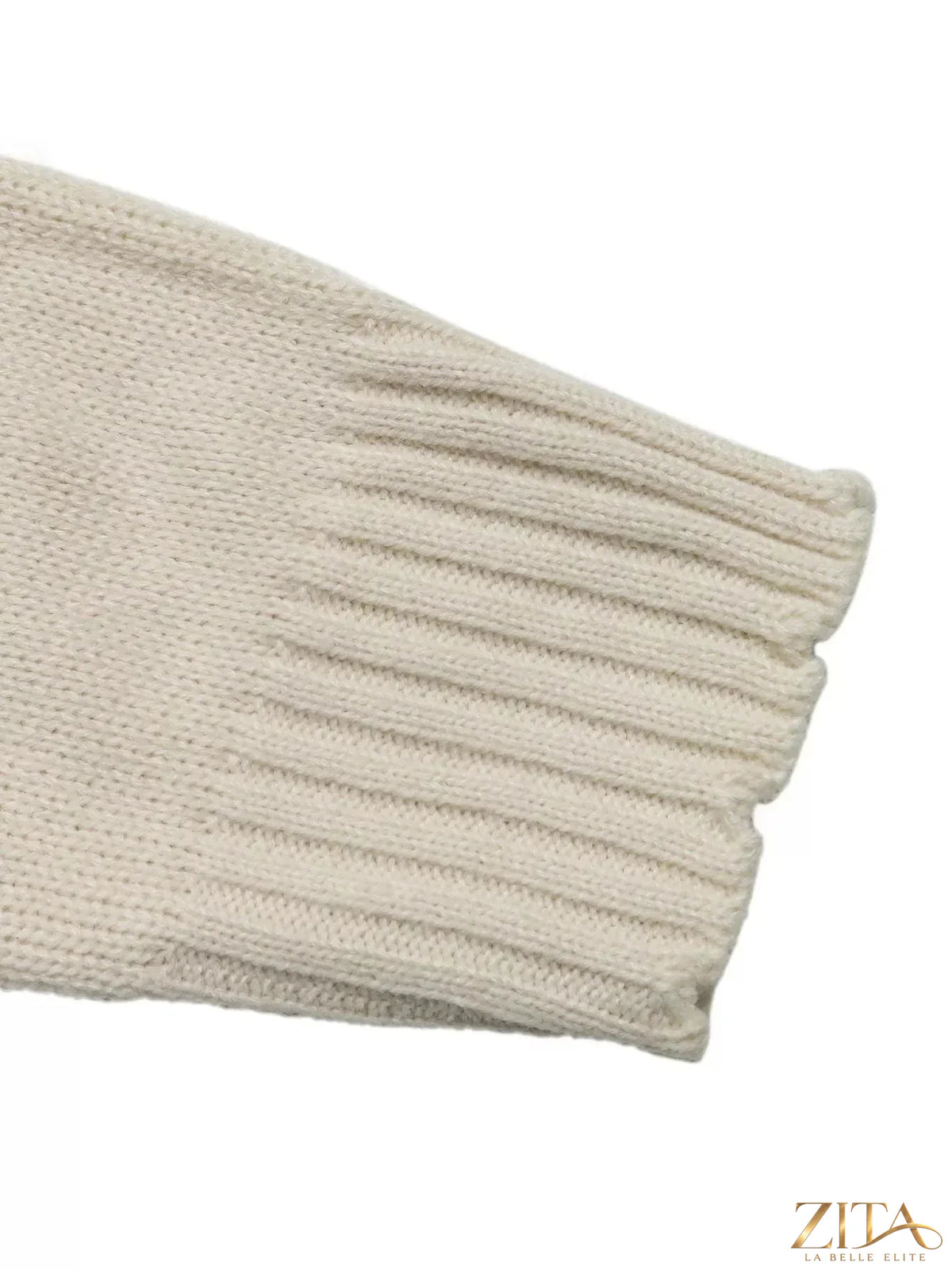 Cable knit turtleneck sweater by Trendsi, showing the textured cream-colored sweater with a cozy fit and high turtleneck collar.