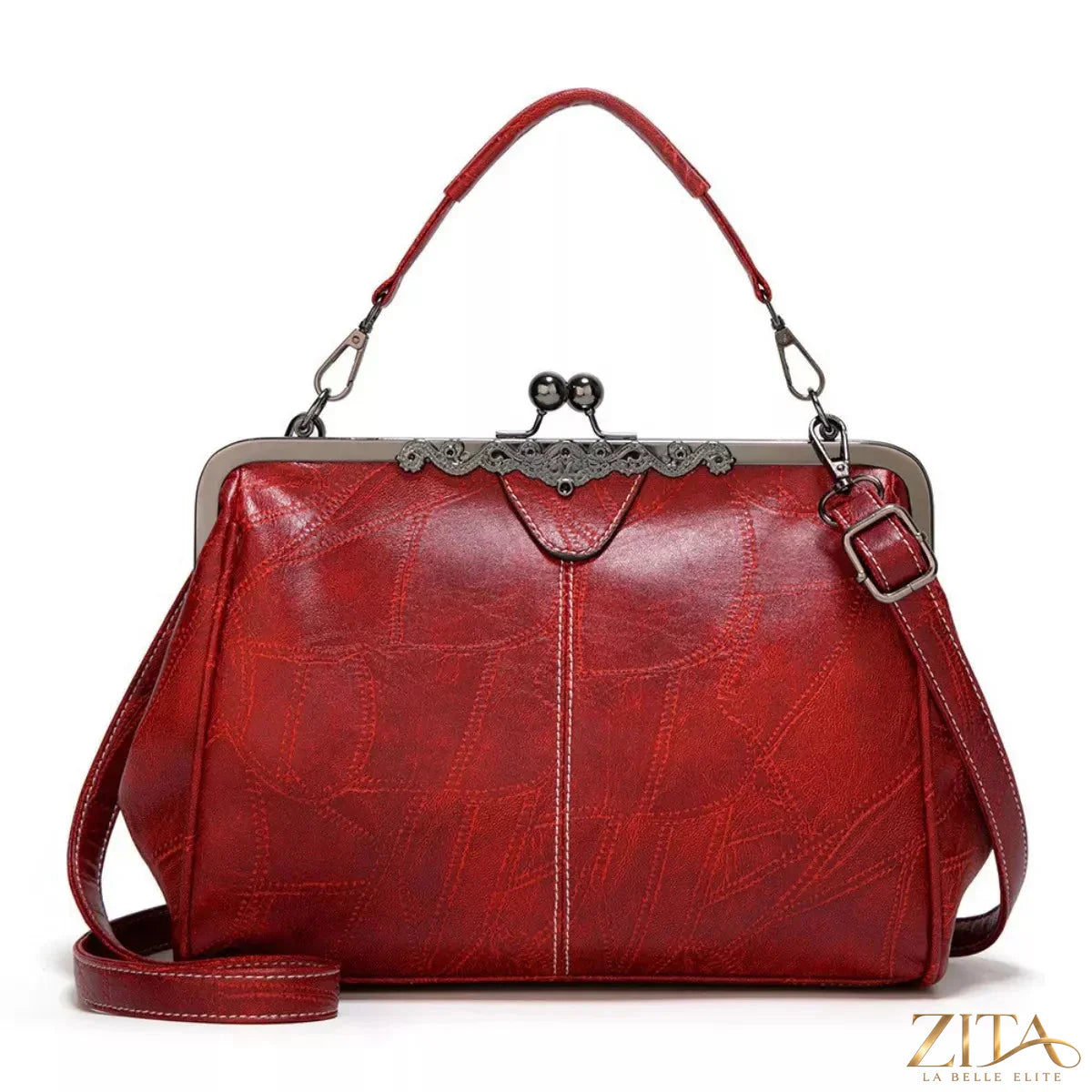 Vintage Zita La Belle Elite Kiss Lock leather handbag with metal clasp and structured design, showcasing classic elegance and craftsmanship.