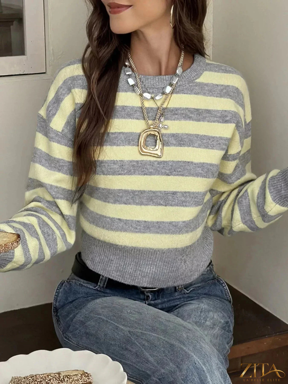 Casual striped cropped sweater by Trendsi featuring a relaxed fit, soft fabric, and stylish horizontal stripe pattern.
