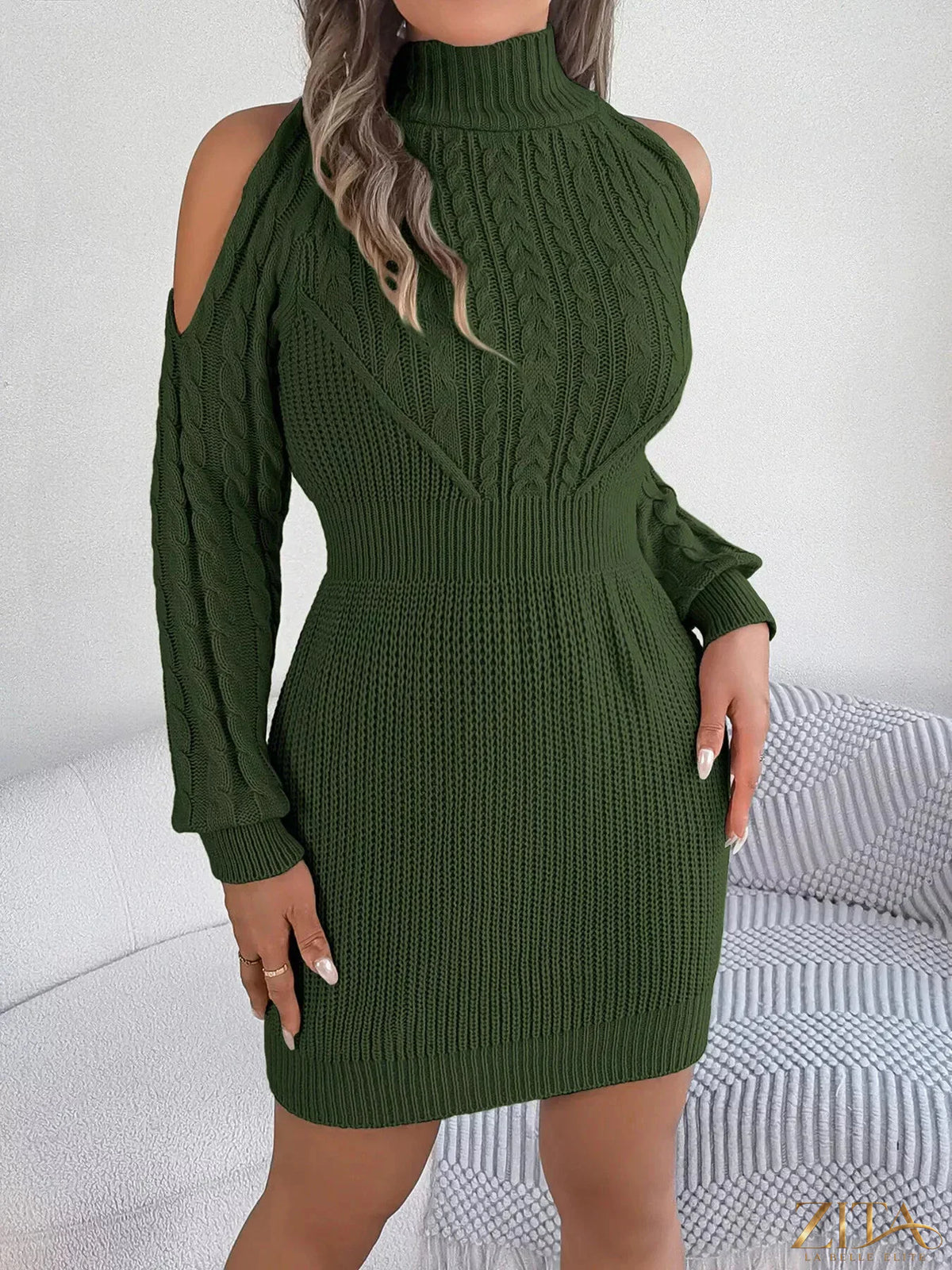 Cold shoulder cable knit turtleneck sweater dress by Trendsi, featuring a cozy knit design with cut-out shoulders and a fitted silhouette.