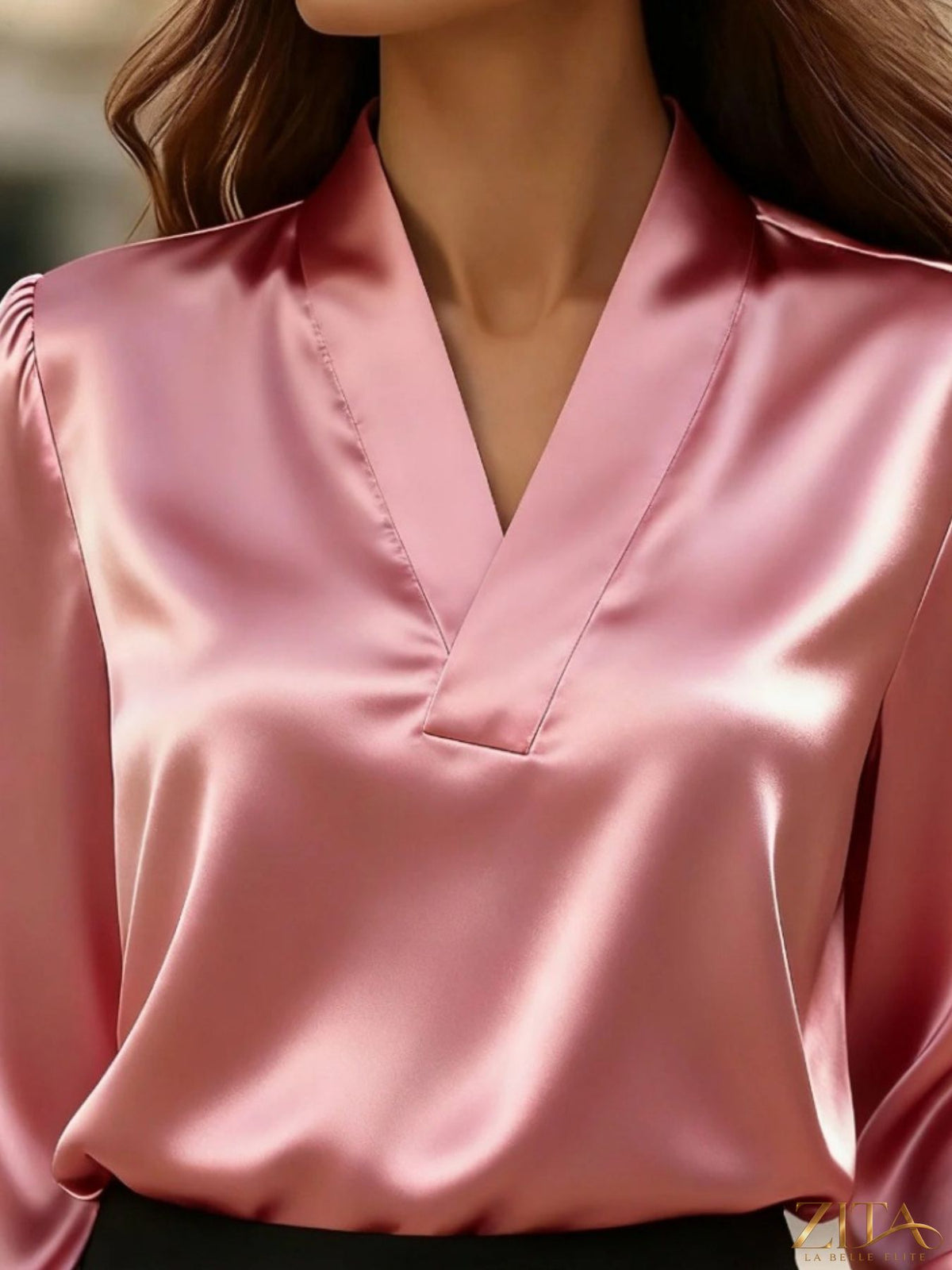 Zita La Belle Elite satin V-neck long sleeve blouse in elegant fabric, shown on a hanger with a smooth, shiny finish.
