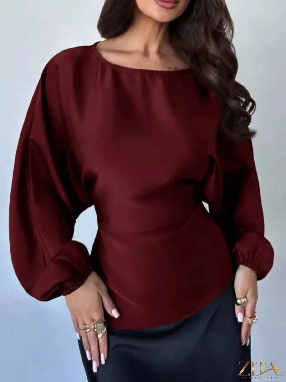 Long sleeve blouse by Zita La Belle Elite featuring a back tie detail and a stylish, feminine fit.