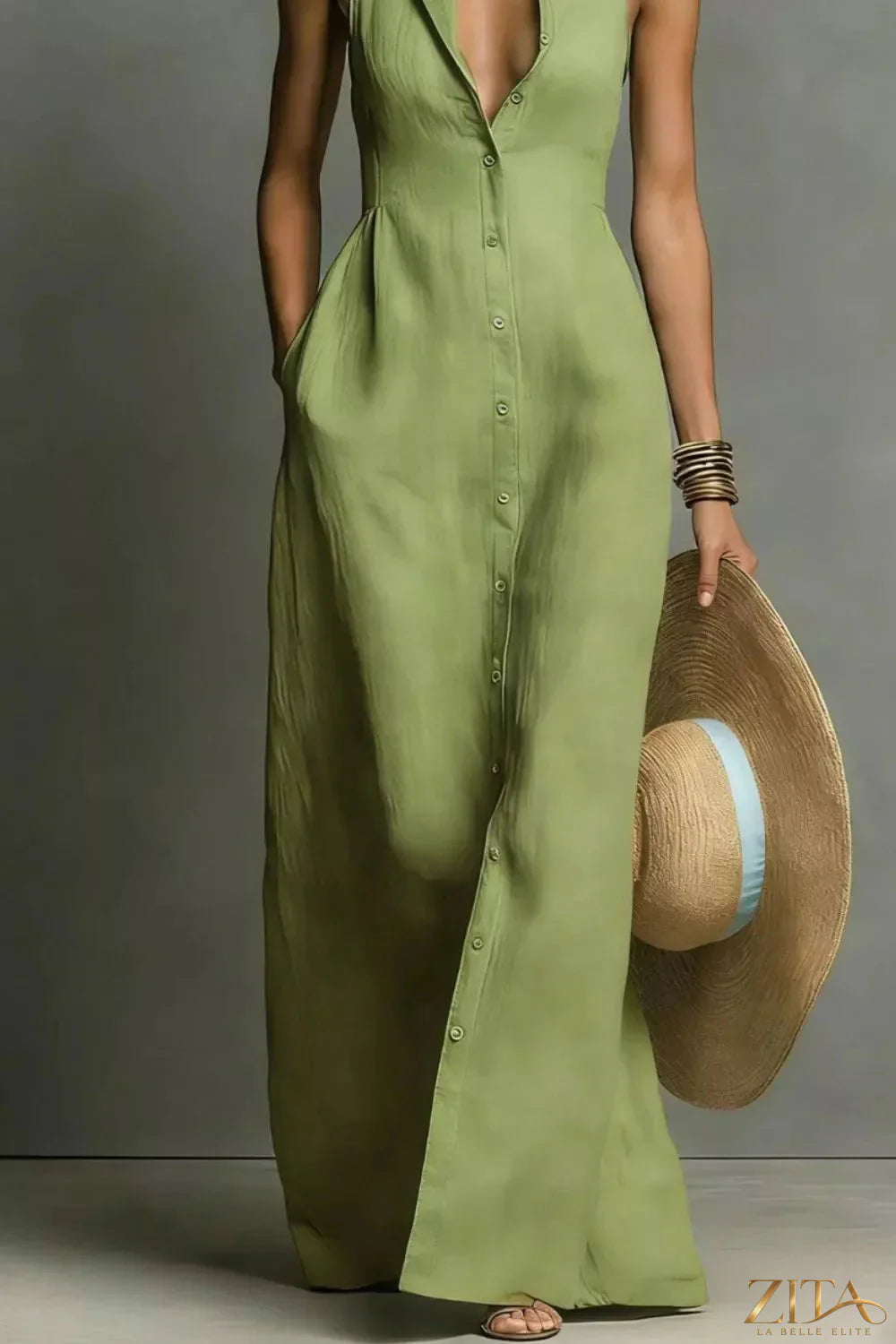 Zita La Belle Elite sleeveless button-down maxi dress in flowing fabric, full-length design with a collared neckline and side pockets.