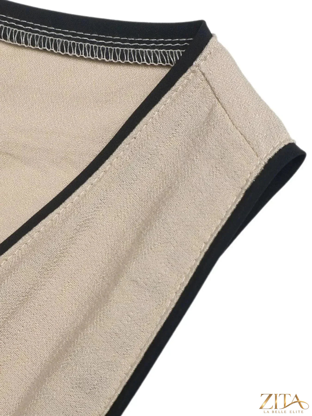 Zita La Belle Elite V-neck sleeveless maxi dress with flowing fabric and elegant design, shown in soft pastel color.