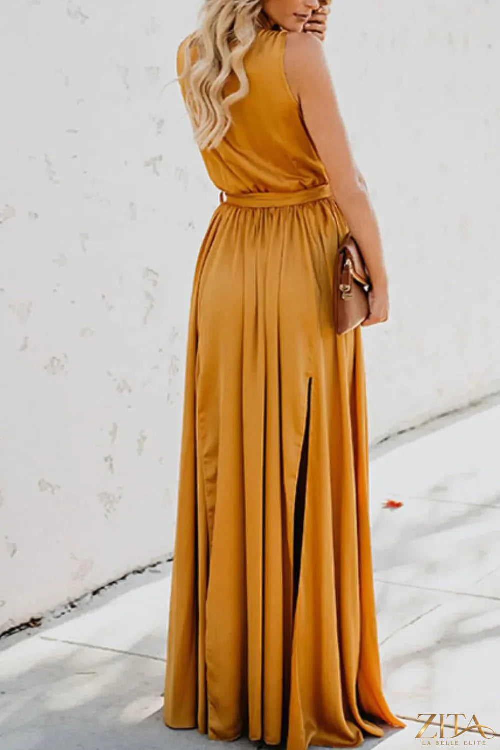 Zita La Belle Elite surplice tie waist maxi dress in flowing fabric, featuring a deep V neckline and elegant silhouette.