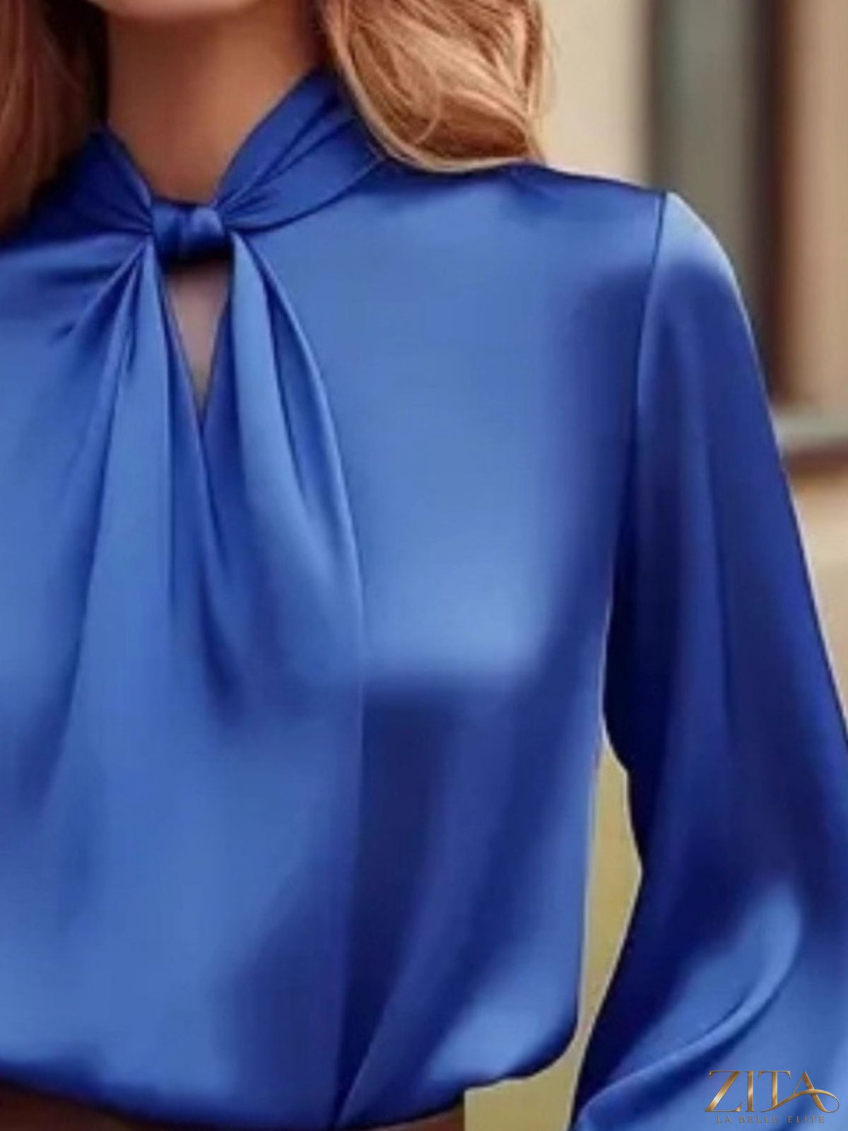 Zita La Belle Elite satin cutout front blouse with elegant design and lightweight fabric, displayed on a neutral background.