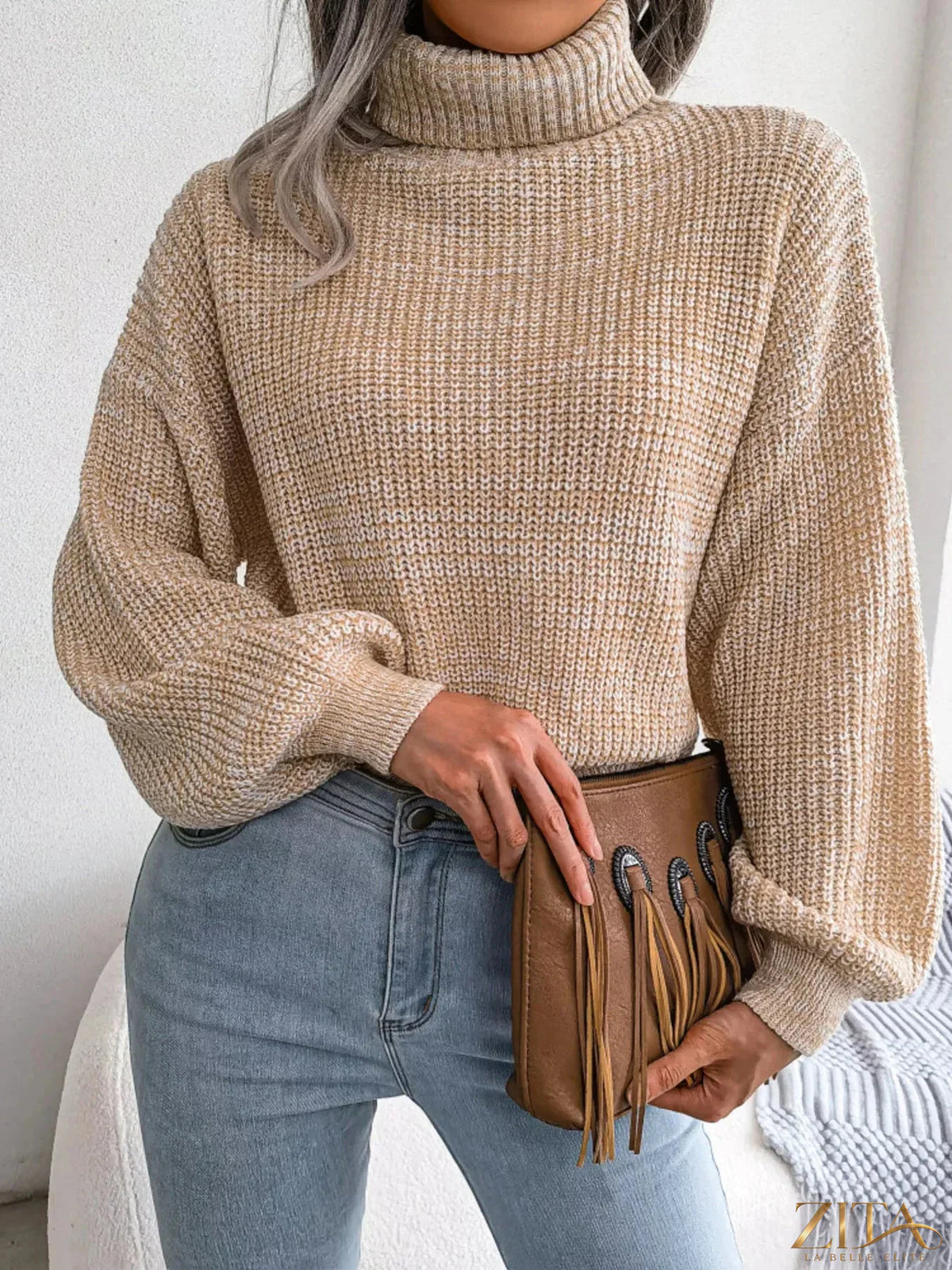 Light gray turtleneck dropped shoulder sweater by Trendsi, featuring cozy knit fabric and relaxed fit, front view.