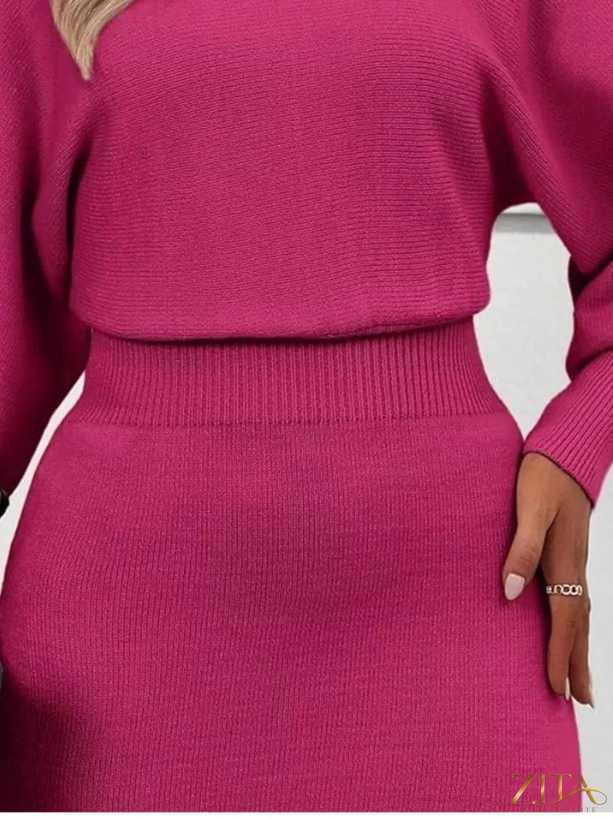 Zita La Belle Elite lantern sleeve bodycon sweater dress in black, featuring fitted silhouette and stylish sleeve details.