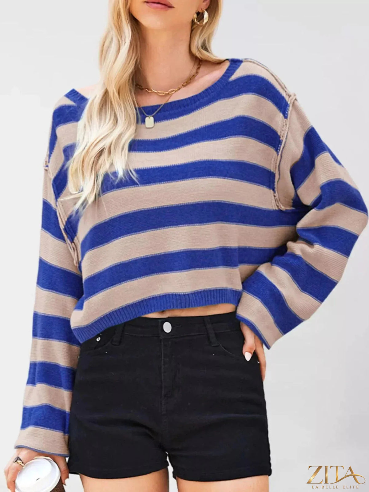 Striped boat neck sweater by Trendsi featuring a classic boat neckline and horizontal stripe pattern in soft, cozy fabric.