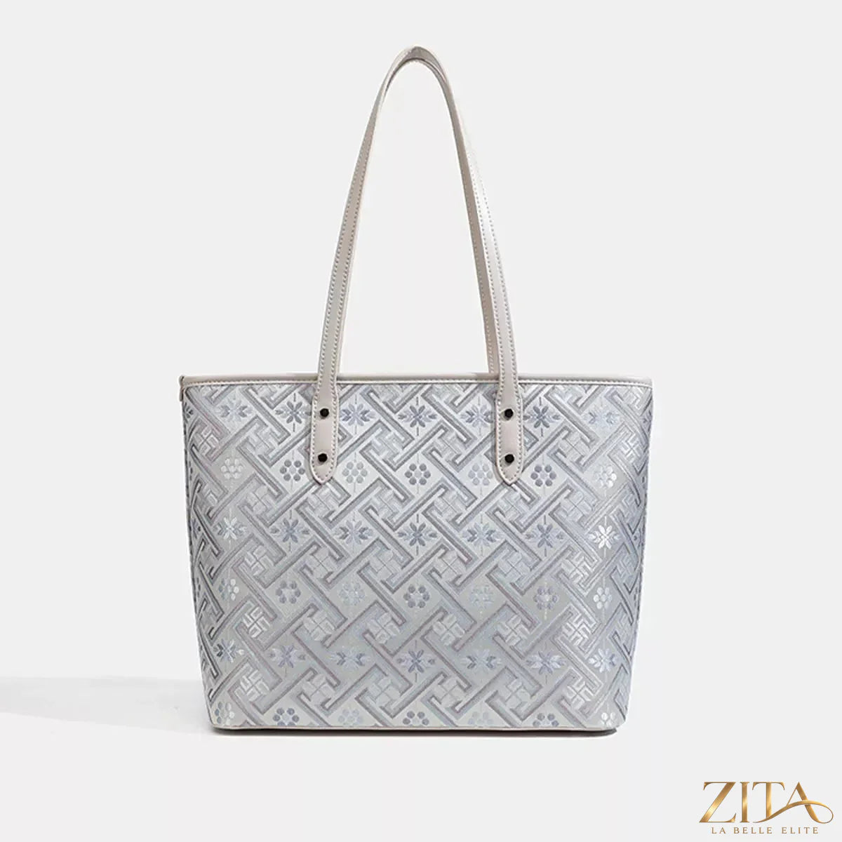 Zita La Belle Elite geometric pattern tote bag with colorful angular designs on durable fabric.