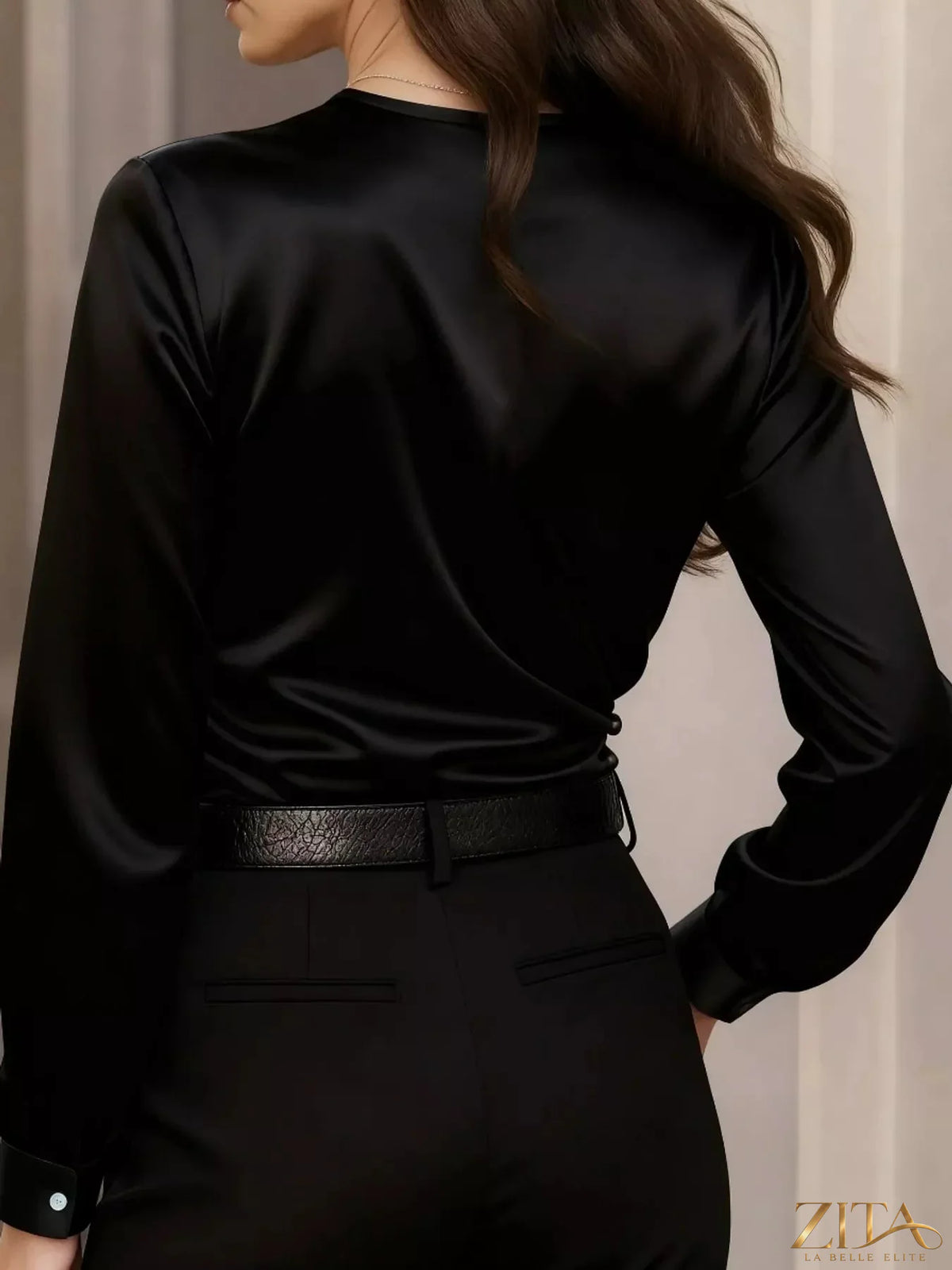 Zita La Belle Elite satin surplice long sleeve blouse with V-neck, featuring a smooth, shiny fabric and elegant design.