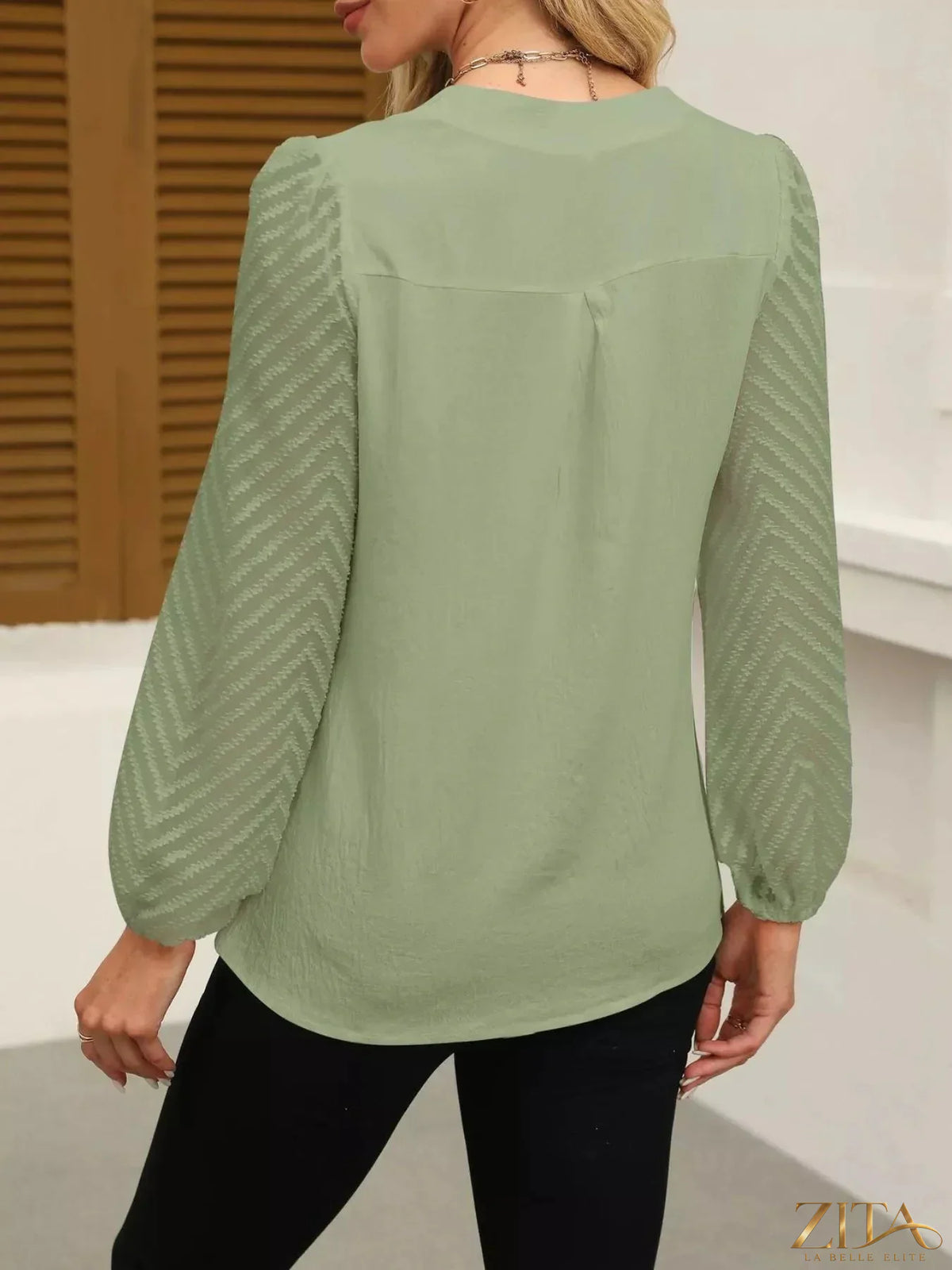 Zita La Belle Elite notched balloon sleeve blouse in soft fabric, featuring stylish design and elegant details.