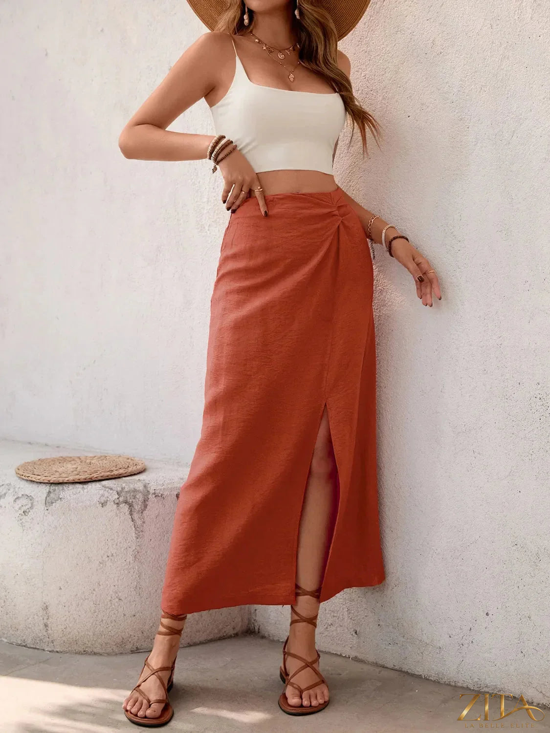 Zita La Belle Elite slit midi skirt in lightweight fabric, featuring a stylish side slit and flowy silhouette.