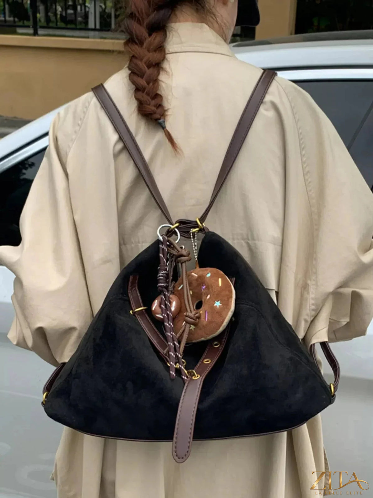 Zita La Belle Elite adjustable strap handbag with decorative charm, featuring a stylish design and versatile carry options.