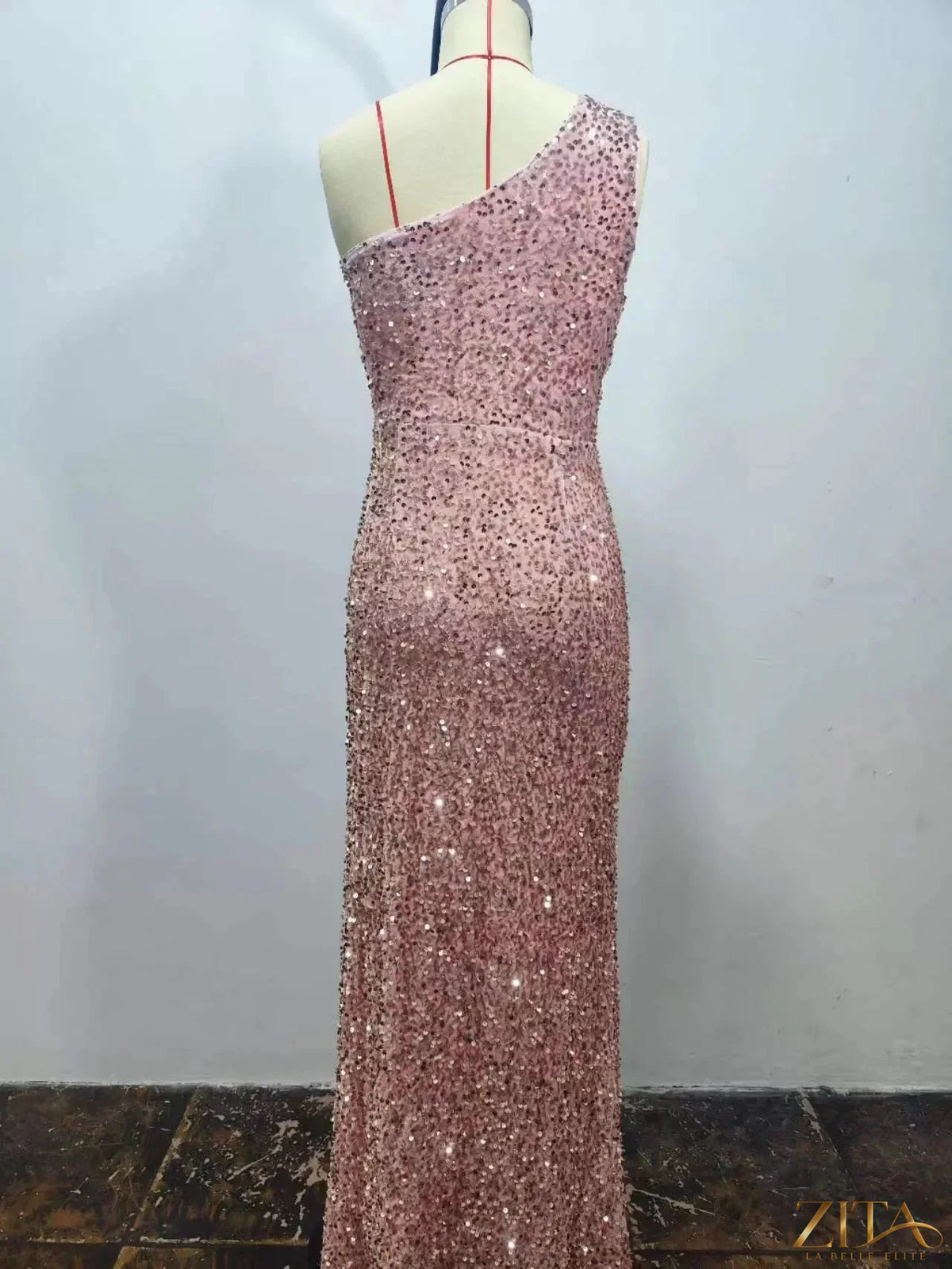 Zita La Belle Elite one-shoulder ruched sequin high-slit evening dress displayed in a stylish image.