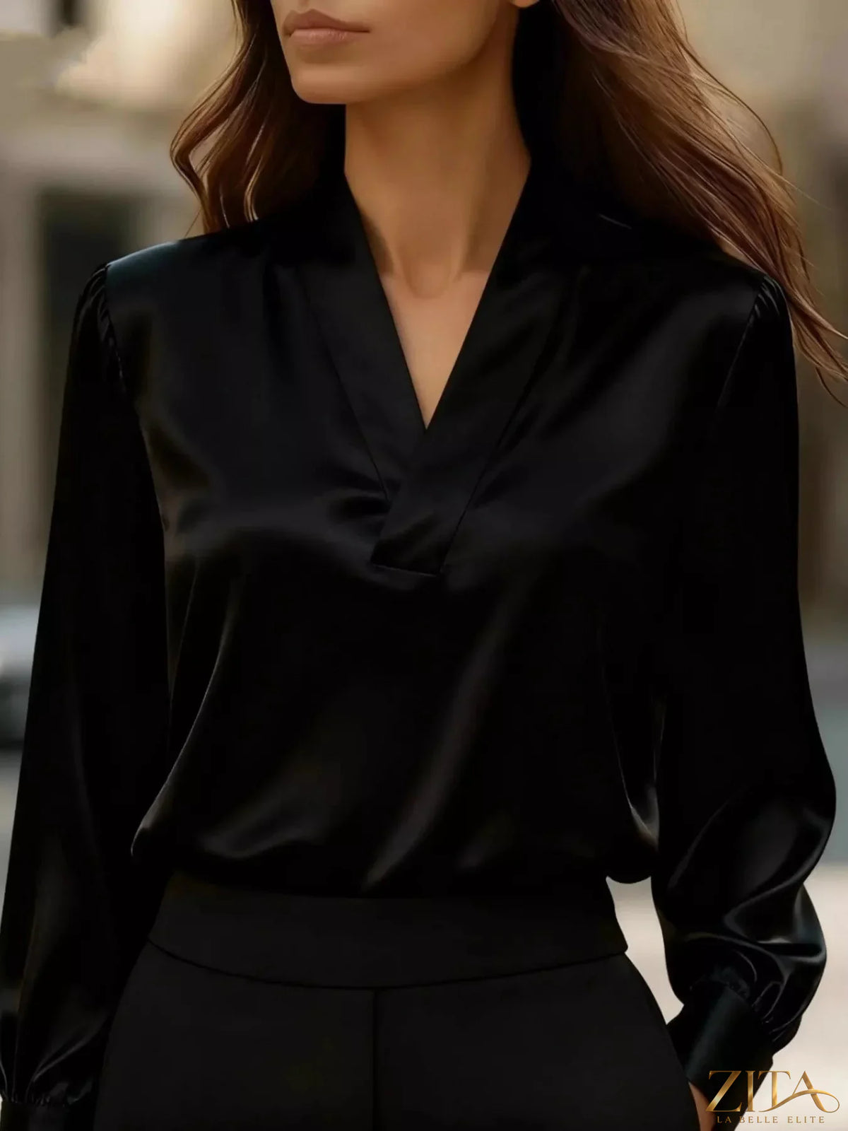 Zita La Belle Elite V-neck long sleeve satin blouse in elegant fabric, shown in a stylish close-up view.