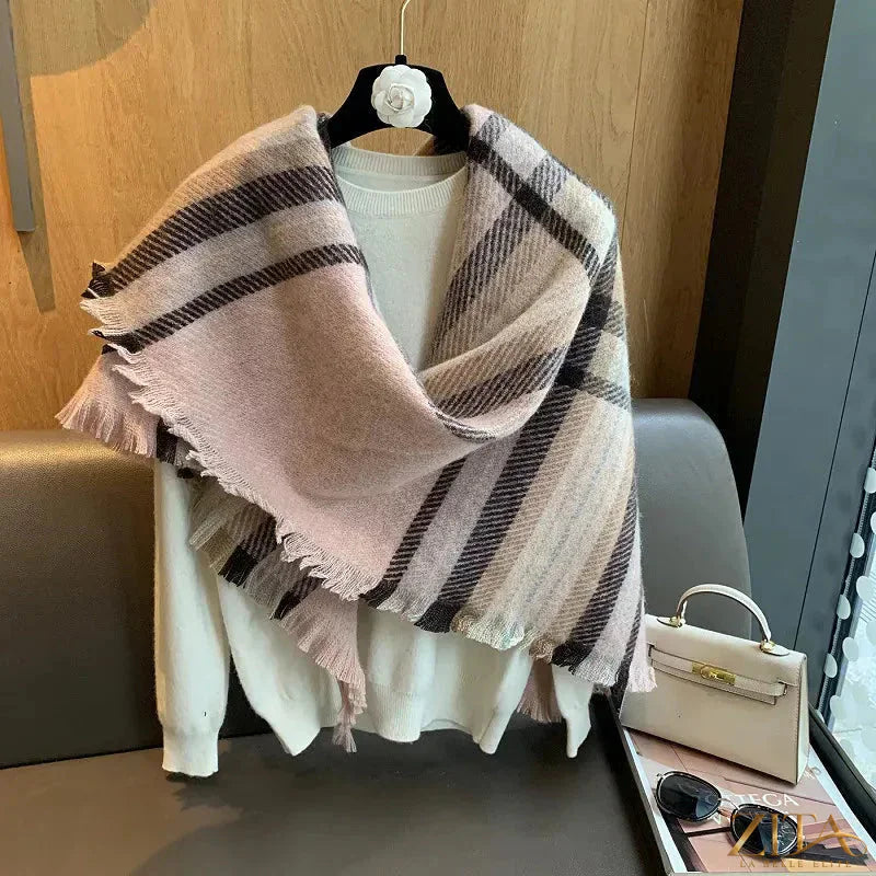 Raw hem plaid scarf by Trendsi, featuring soft woven fabric with fringed edges in red, black, and white plaid pattern.