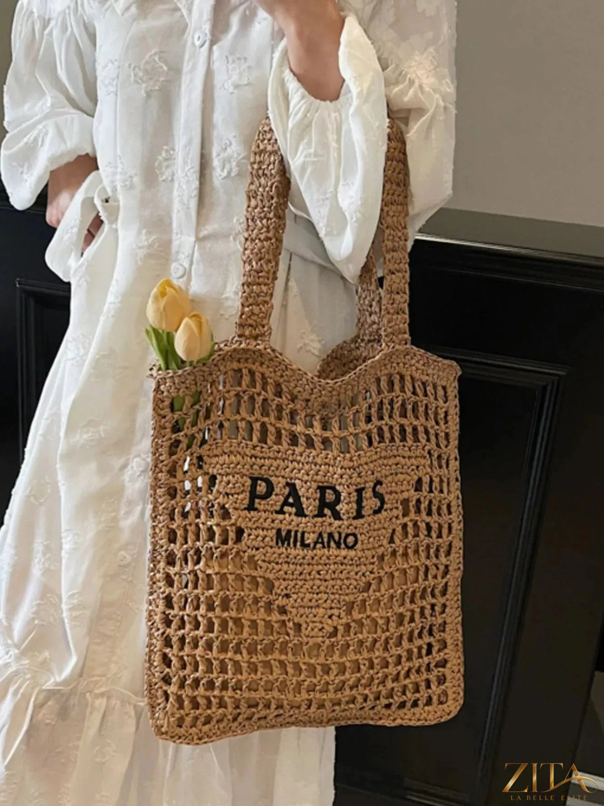 Crochet knit shoulder bag by Zita La Belle Elite featuring a textured design and soft strap, perfect for casual style.