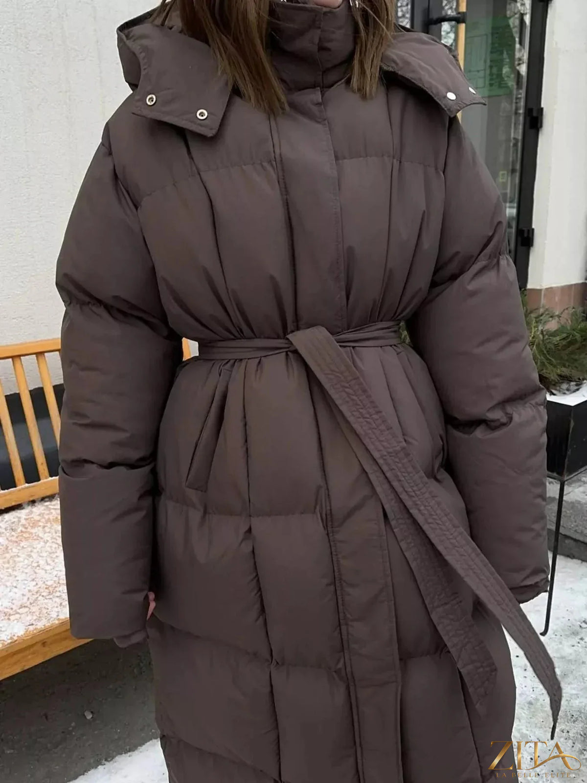 Zita La Belle Elite longline padded winter coat with belt, featuring a cozy insulated design and a stylish silhouette.