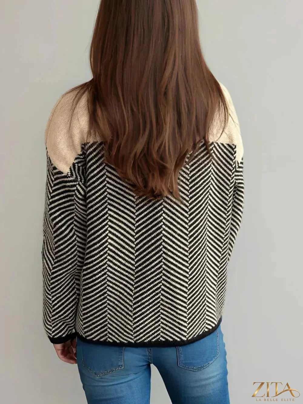 Contrast turtleneck long sleeve sweater by Trendsi, featuring a cozy knit fabric and stylish design in black and white.