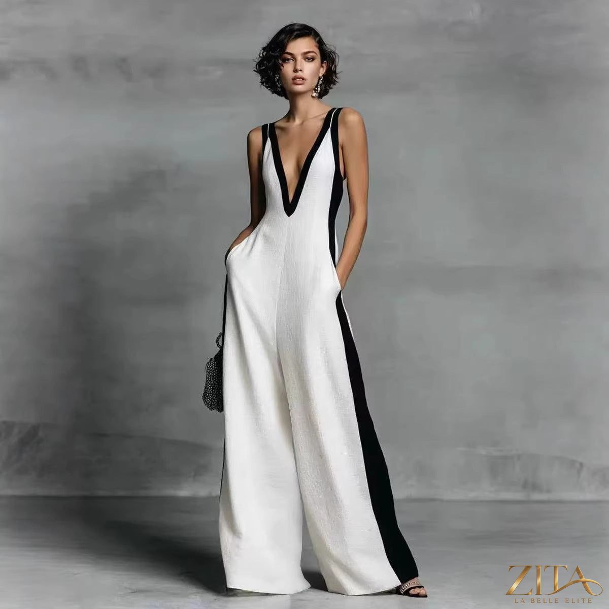 Color-block sleeveless V-neck wide-leg jumpsuit by Zita La Belle Elite, casualwear with bold color blocks and relaxed fit.