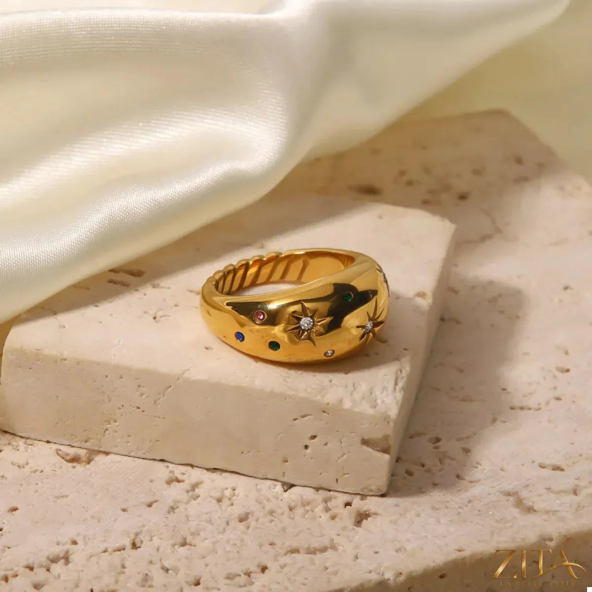 18K gold-plated zircon ring by Zita La Belle Elite, featuring a sparkling round-cut zircon gemstone and elegant band design.